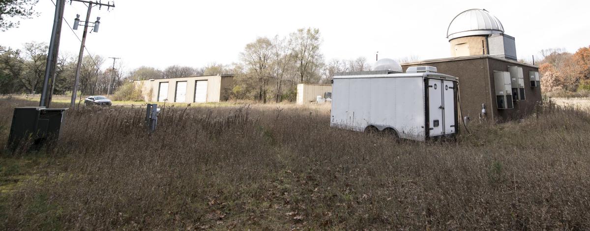 Newcomb Tract trailer and out buildings