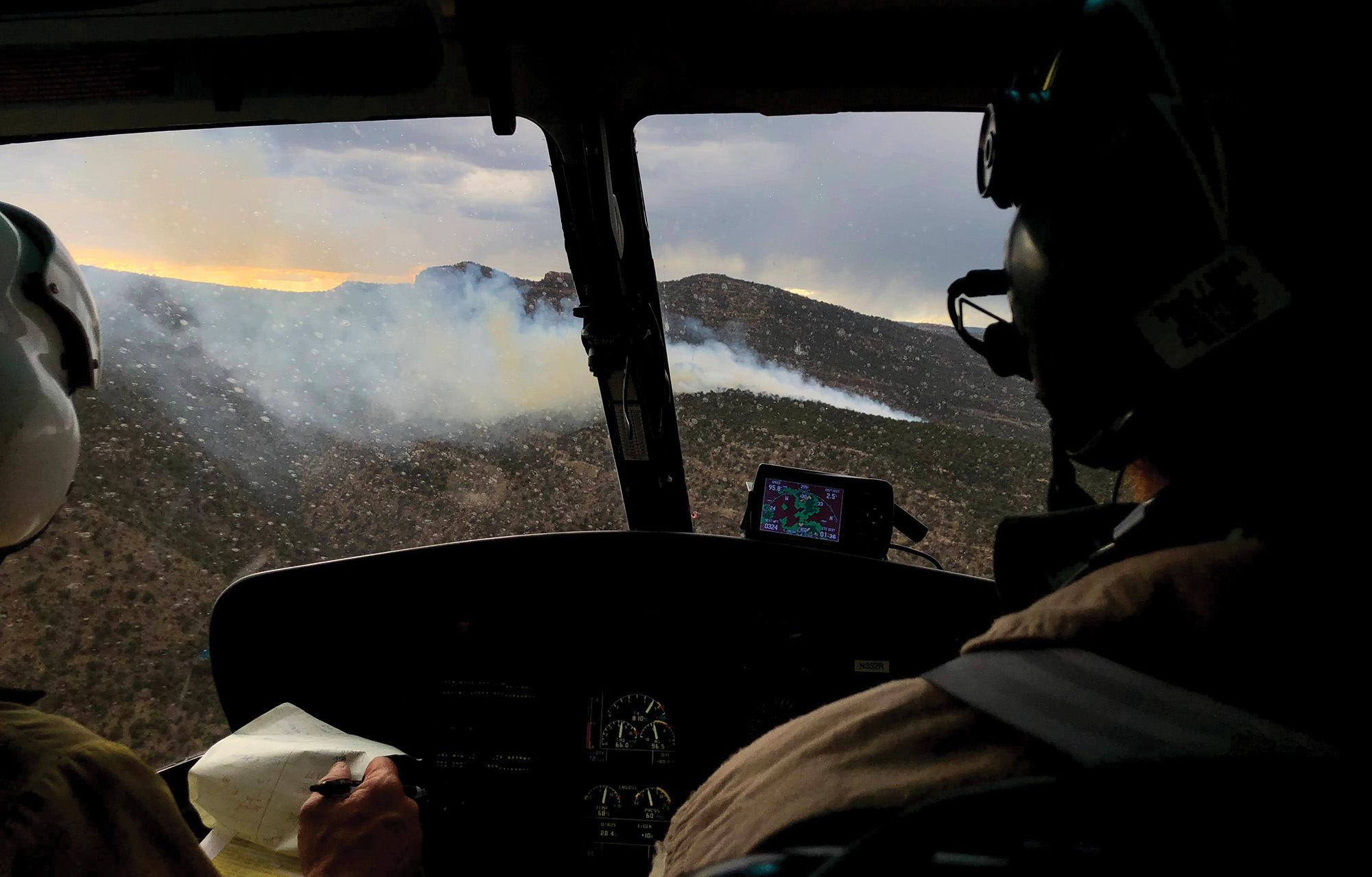 The Moab helitack crew approaches a fire in the Book Cliffs of Southeast Utah.
