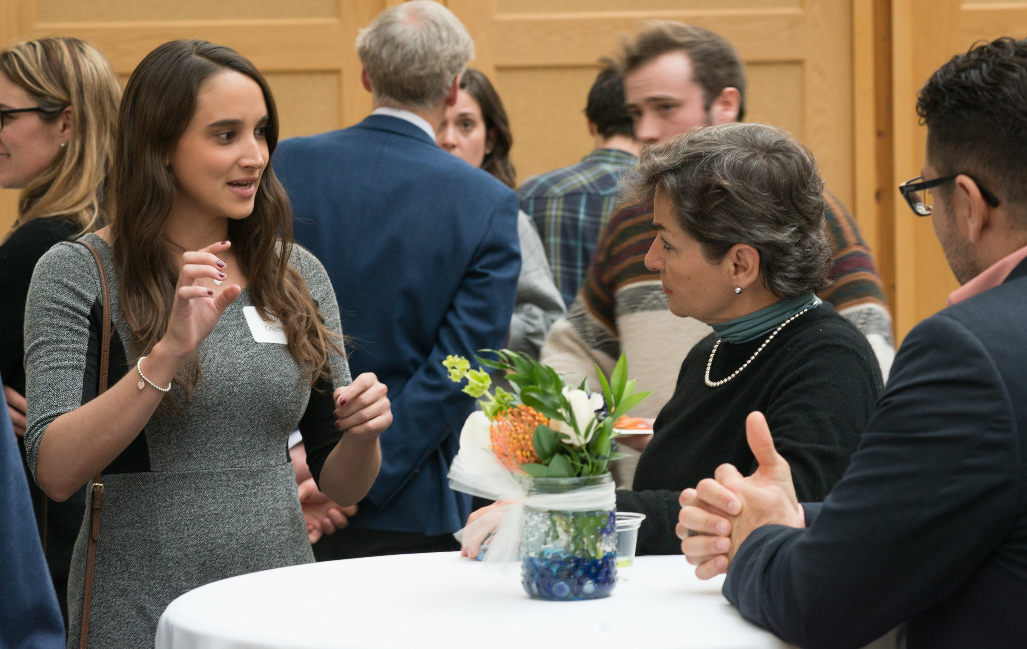 Young woman talking to an alum