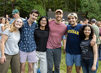 A group of students looking into the camera, smiling, at U-M SEAS 119th annual Campfire 2025