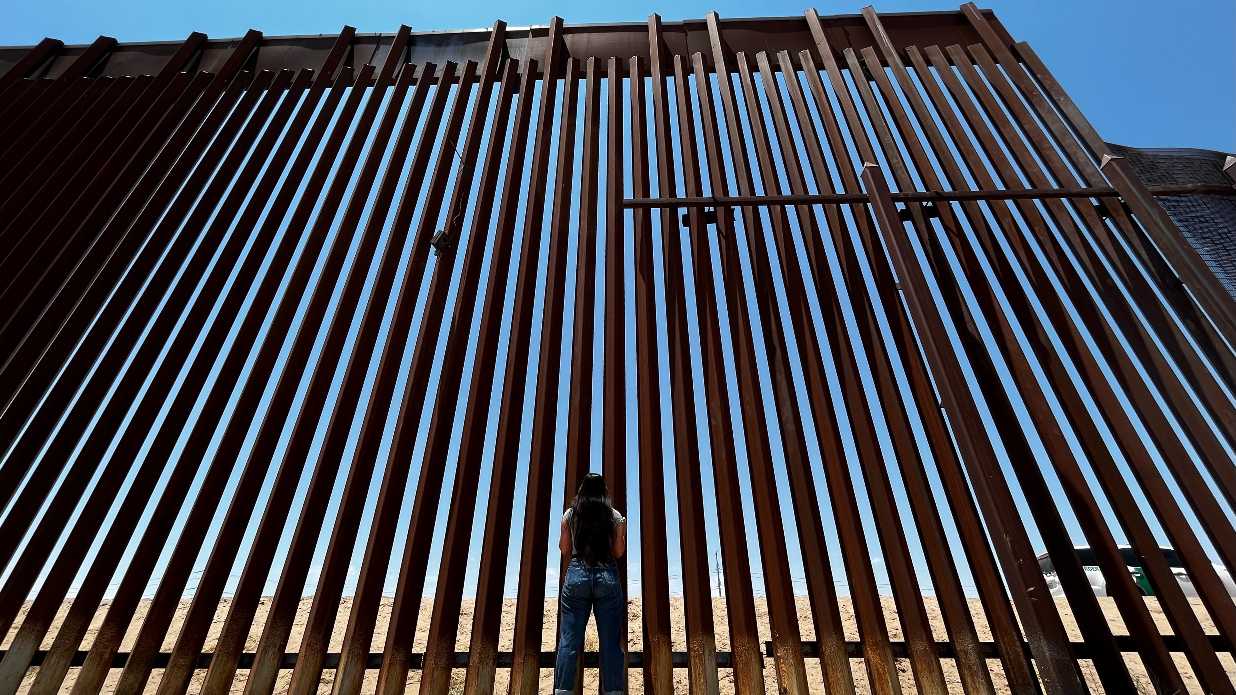 The border wall in San Elizario, Texas, where Vianey Rueda grew up.