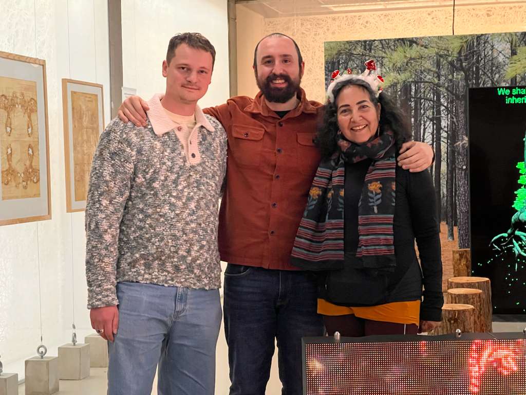 A photo of Ivette Perfecto with her collaborators, Zachary Hajian-Forooshani and Filipp Groubnov.