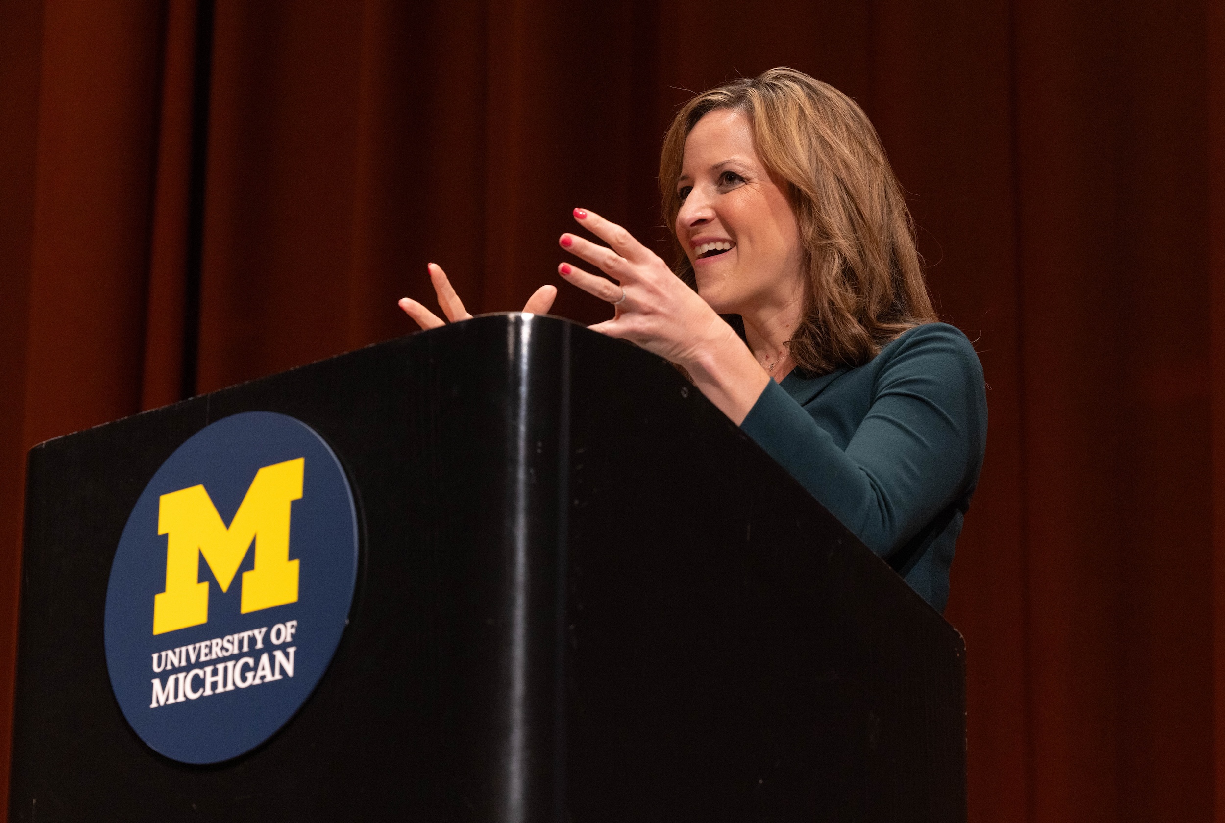 Jocelyn Benson speaking at the Michigan Climate Action Network's annual summit, which was hosted this year at the University of Michigan.