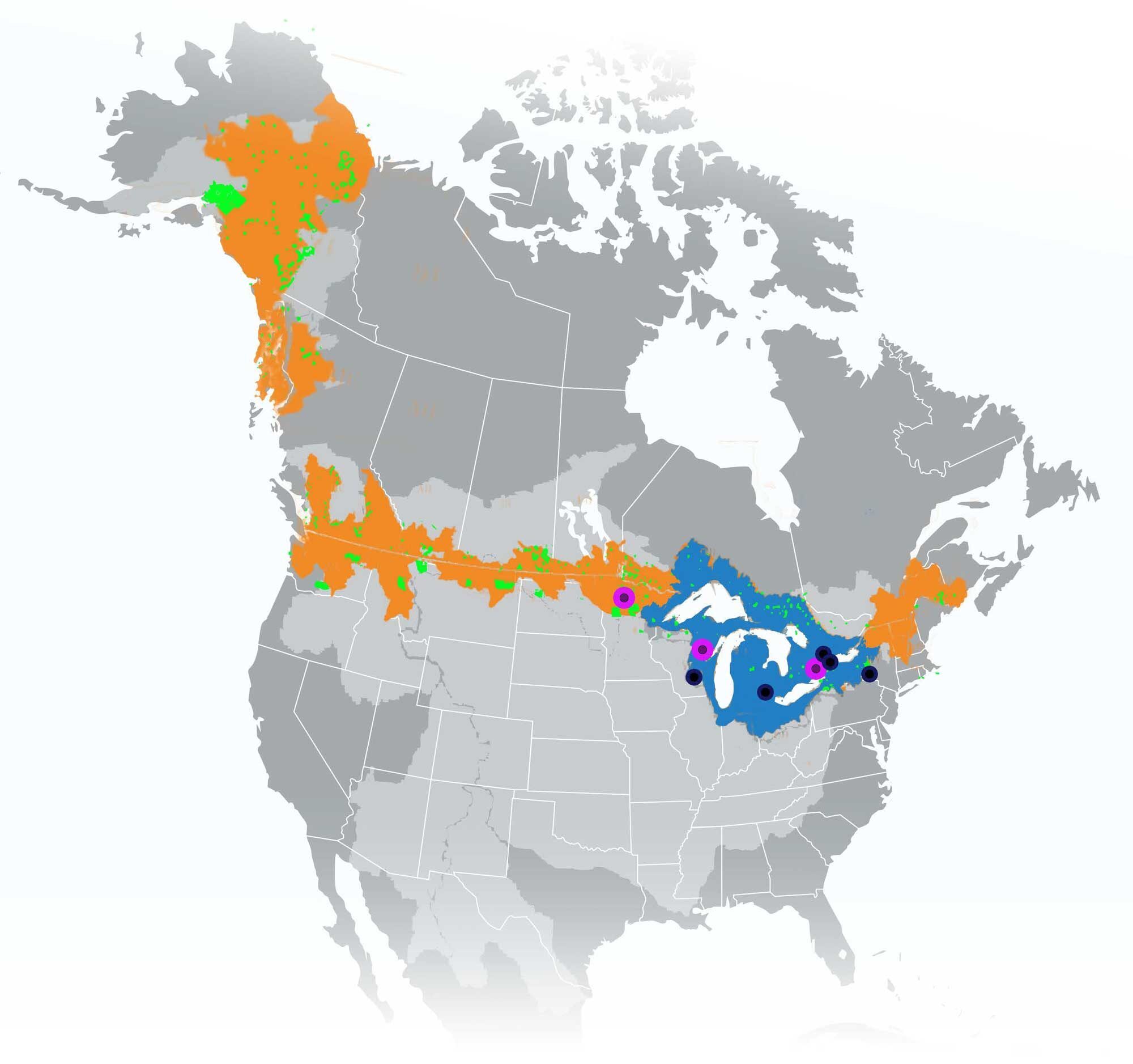 Above: The new Global Center will draw on relationships and policies from transboundary watersheds and Indigenous Territories along the entire U.S.-Canada border (orange and green regions, respectively). The Great Lakes Basin (blue) serves as an initial area of focus. Directly funded project partners are identified as black dots, with Indigenous partners highlighted by a purple ring. All of North America’s transboundary basins are highlighted in light grey for reference.   Image credit: SEAS and Office of the U-M Vice President for Research