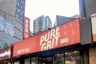 Exterior of Pure Grit BBQ shop