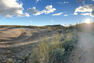 Lake Pleasant (a portion of which is visible at left in the photo above) is one of many impoundments Drew Gronewold visited during his field work in western Arizona where water management authorities are balancing diminishing supplies with regional demands for freshwater. photo credit: Drew Gronewold