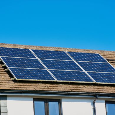 Residential home with rooftop solar panels.