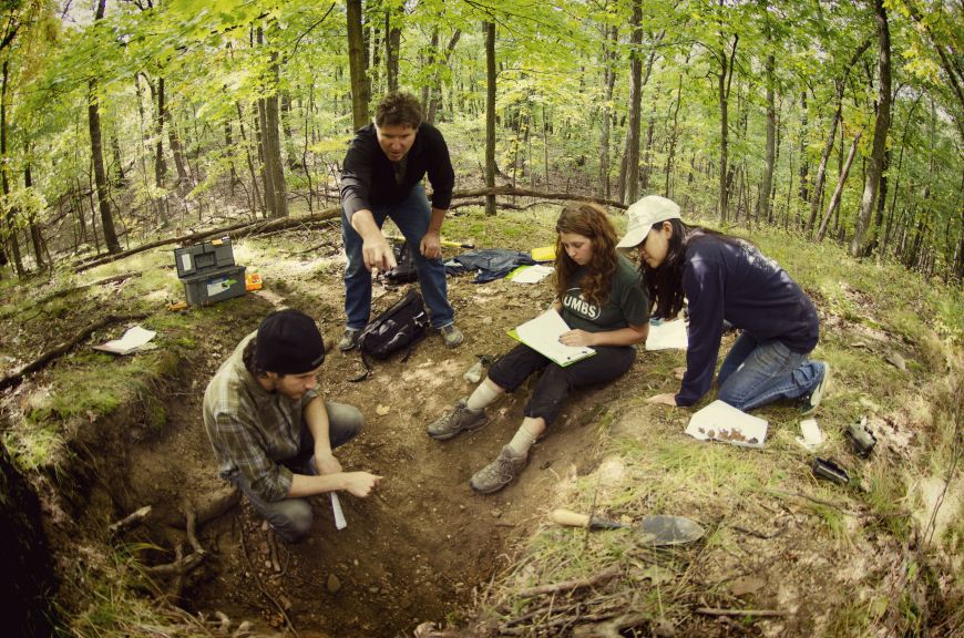 Professor Don Zak working with students at Stitchfield Woods